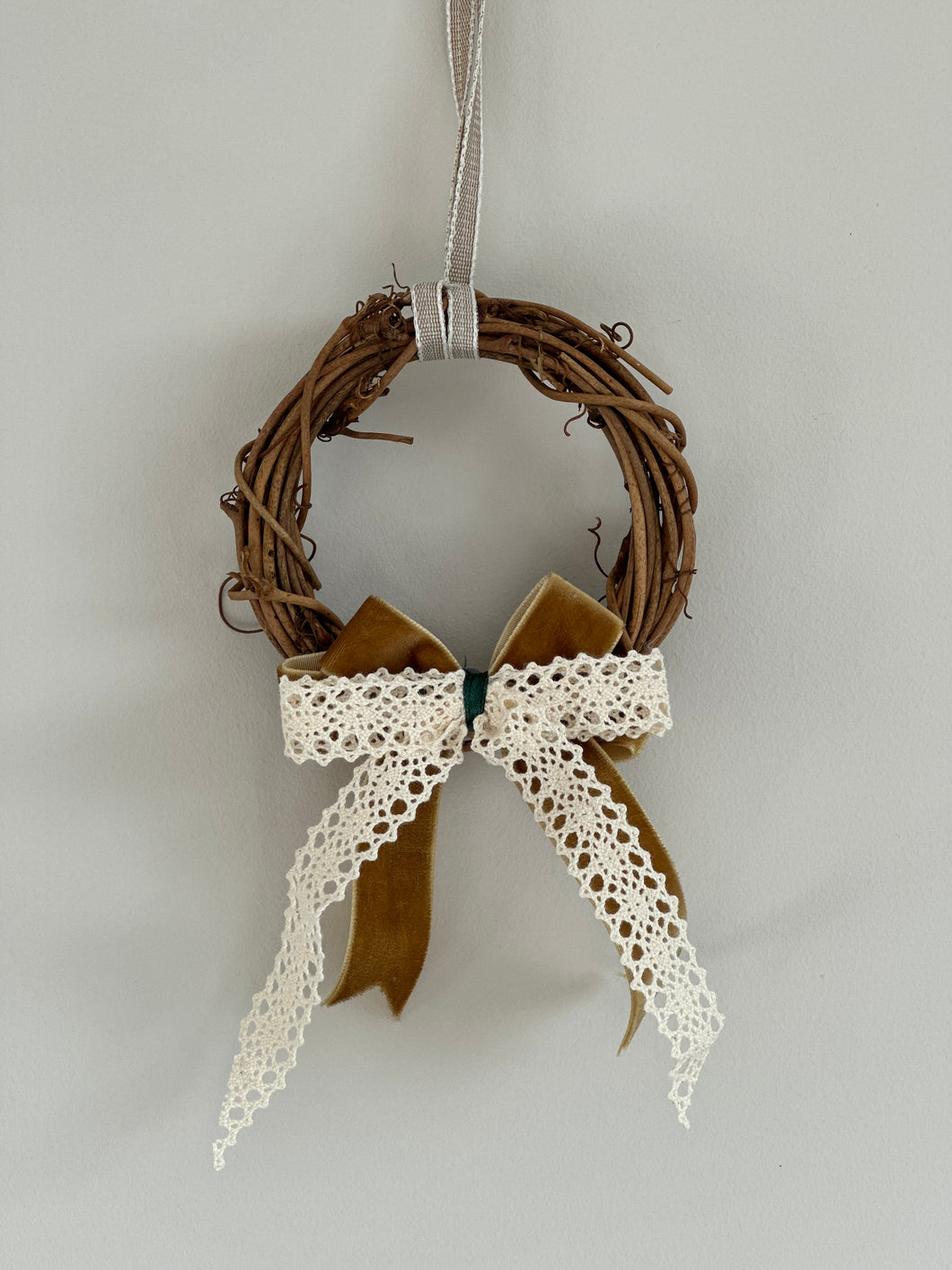 Wreath decoration with handmade amber bow